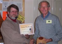 Tony Walton Presents Dave Ward with his certificate